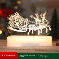 LED light decoration of Santa's sleigh pulled by two reindeer on white base