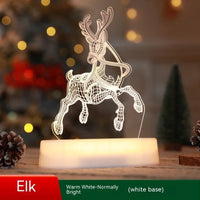 Glowing 3D wireframe elk LED night light with warm white illumination on white base