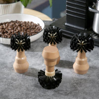 Close-up of coffee machine cleaning brush bristles