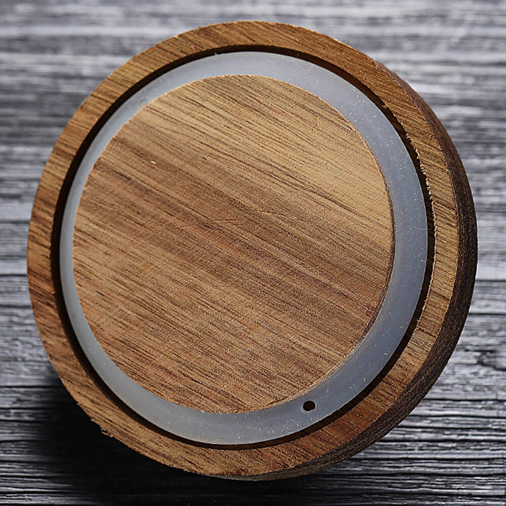Natural wood lid with hand-turned knob detail for glass storage jar
